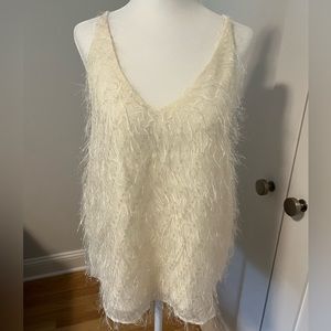 On Twelfth shimmer top, color is ivory. Size S.